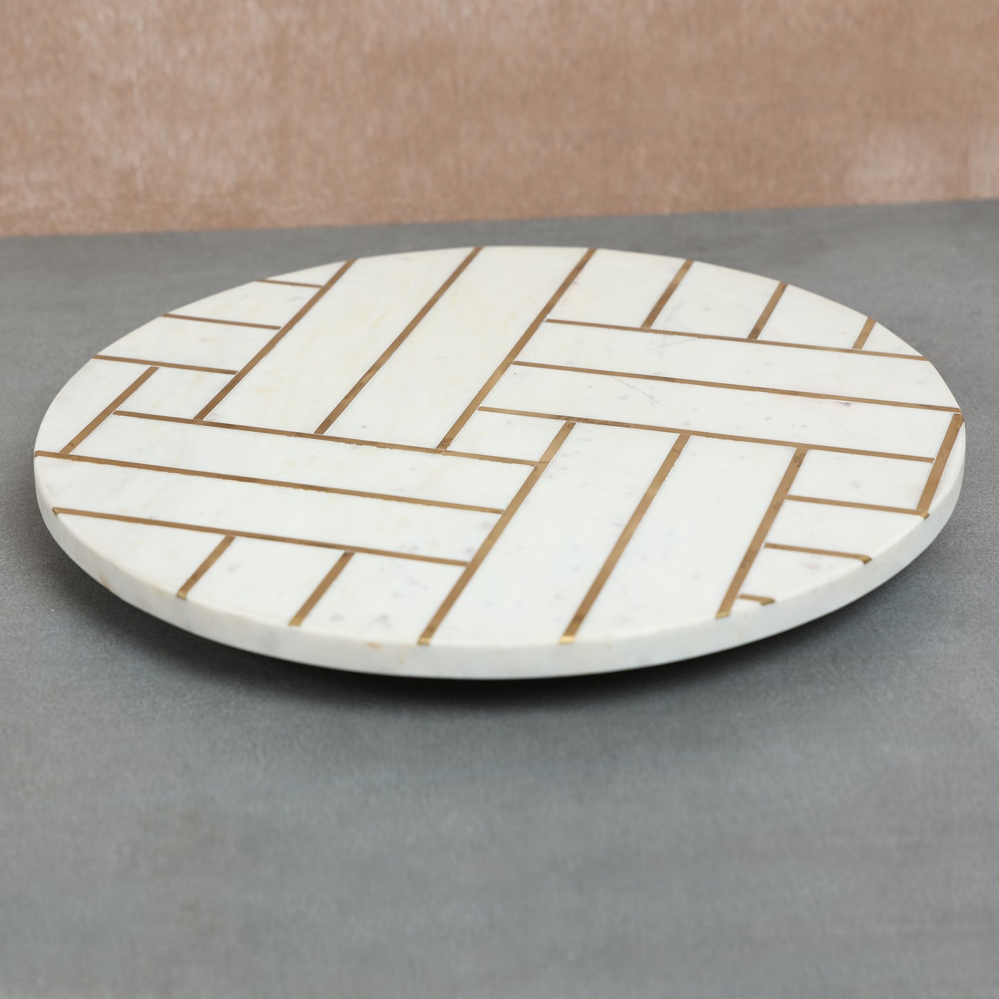 Marble lazy susan with brass inlay