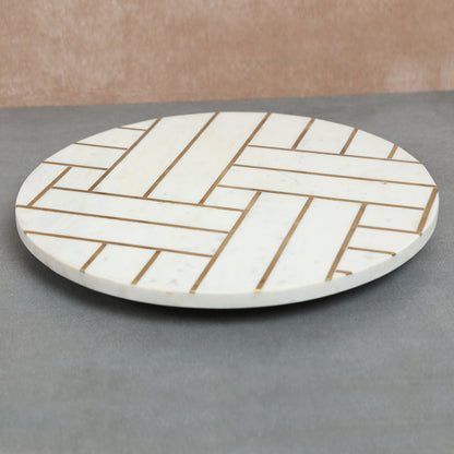 Marble lazy susan with brass inlay