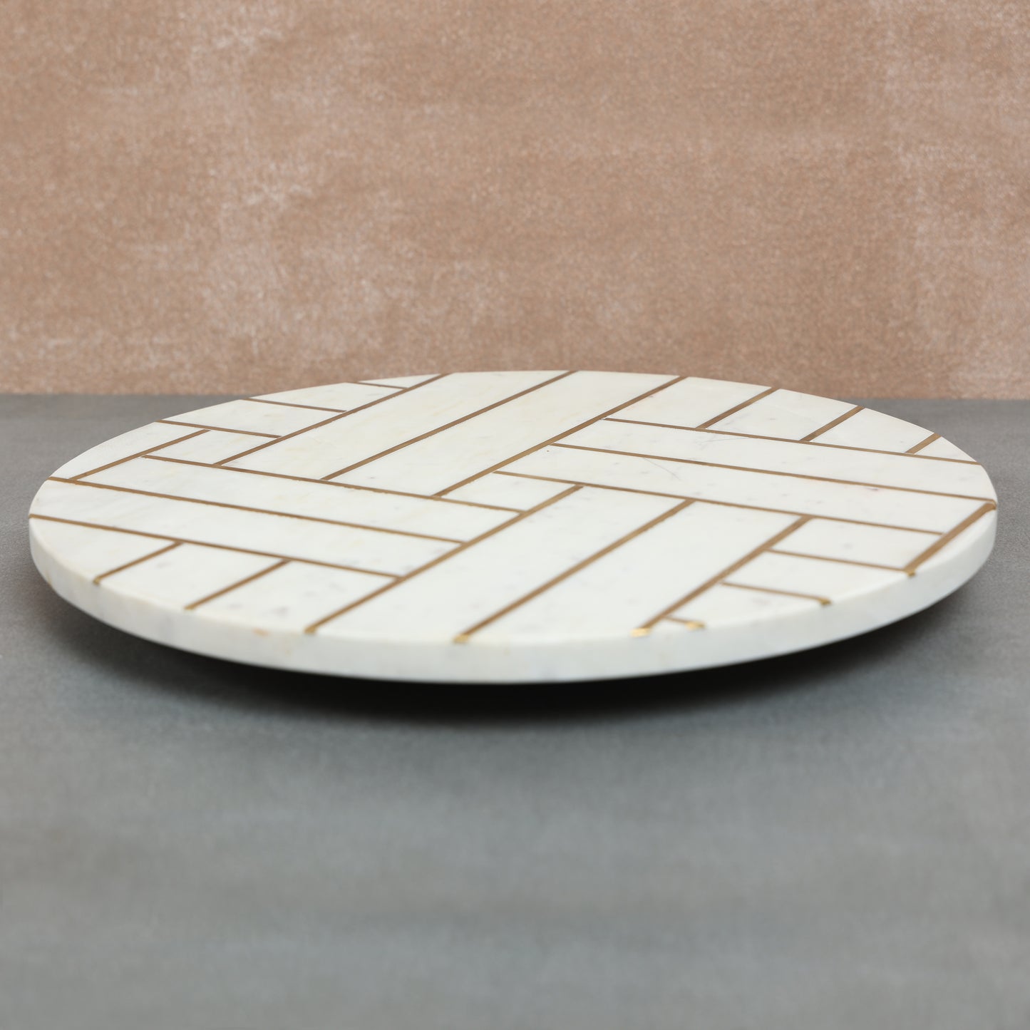 Marble lazy susan with brass inlay