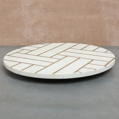 Marble lazy susan with brass inlay