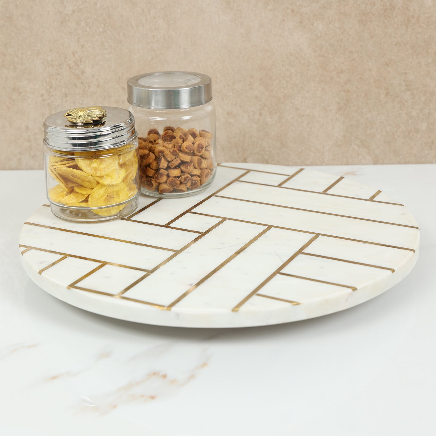 Marble lazy susan with brass inlay